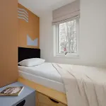 Апартаменты Blue And Orange With Desk In The Center By Renters